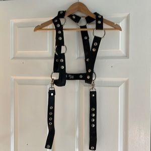 Leather harness with leather suspenders. Like new